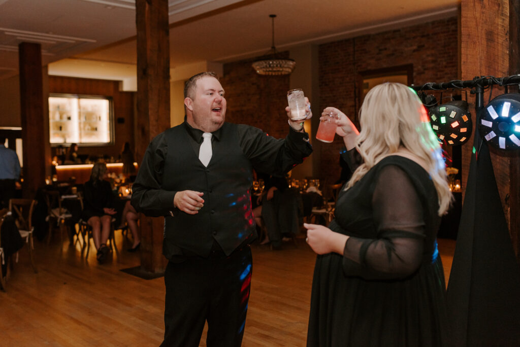 groom and sister dancing during wedding reception at the montvale event center