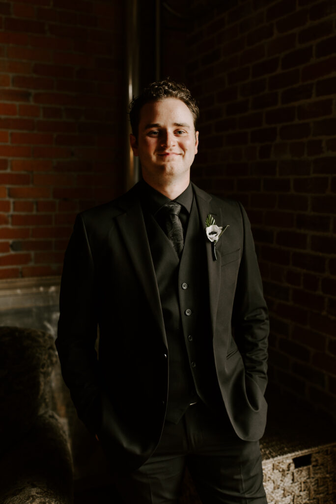 Portrait of the groom at The Boxcar Room