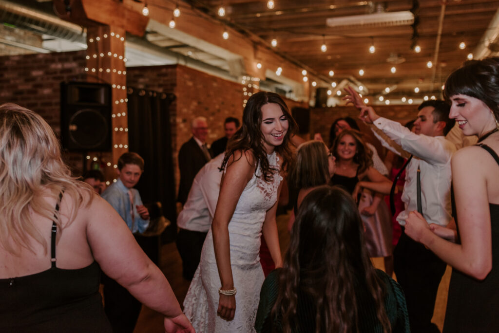 bride dancing during the wedding reception