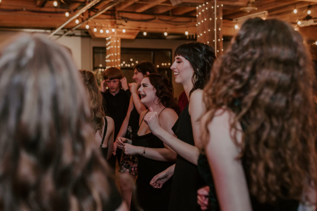 bridesmaids dancing at the wedding reception