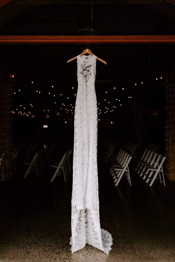 Bride's hanging wedding dress.
