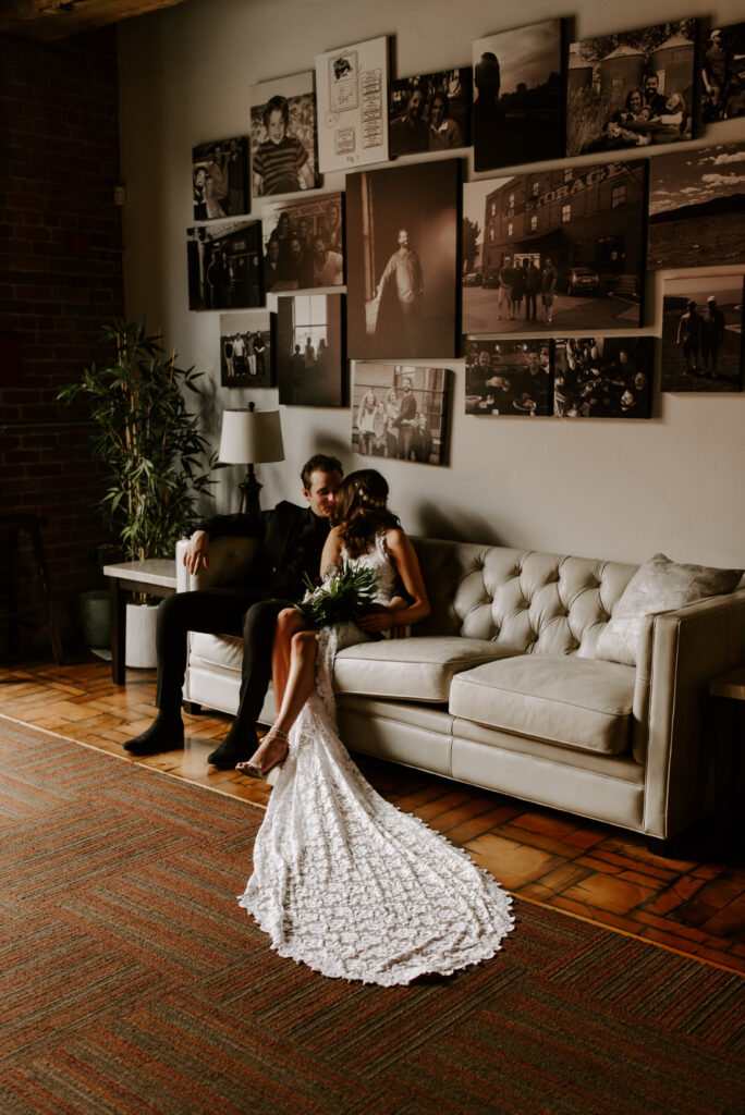 Bride and groom portrait on a couch