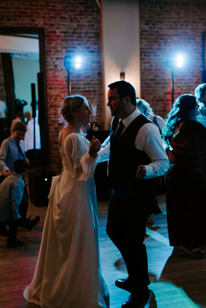 bride and groom dancing during wedding reception at montvale event center