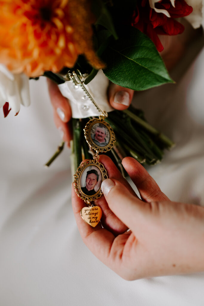 bride's bouquet included photo charms of her late brother and grandfather