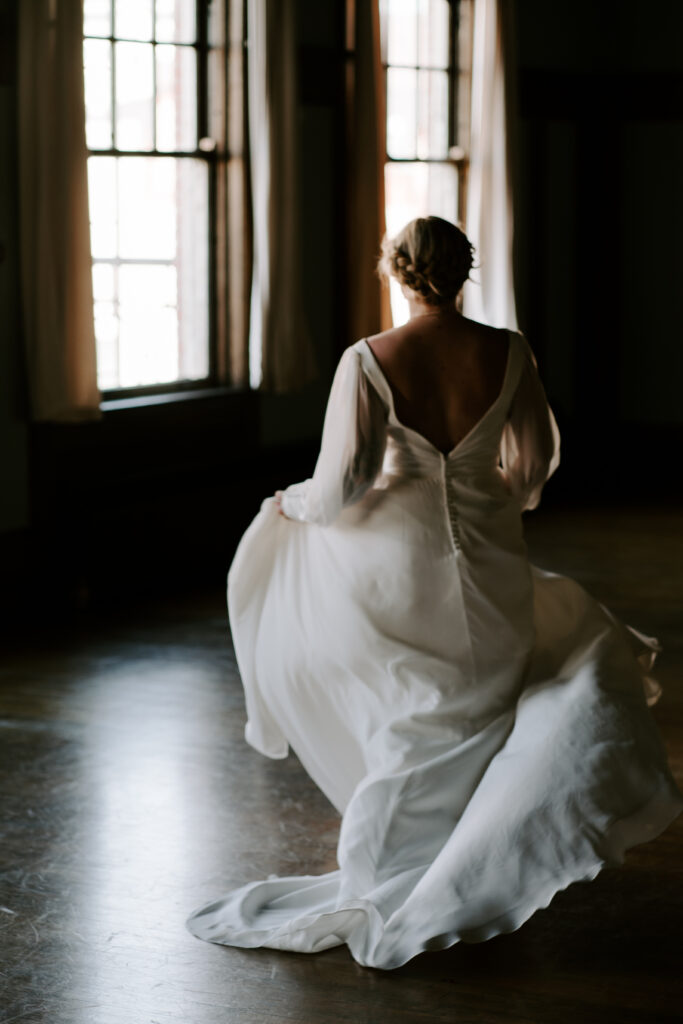bride running in her wedding dress