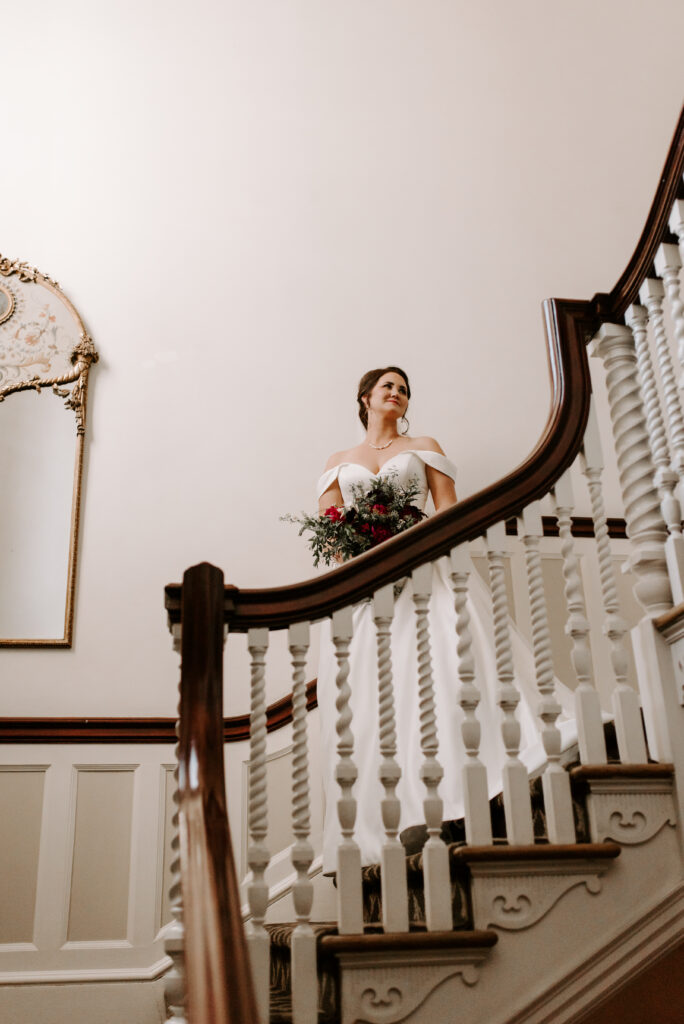 Bride on the stairs of wedding venue at Spokane Club