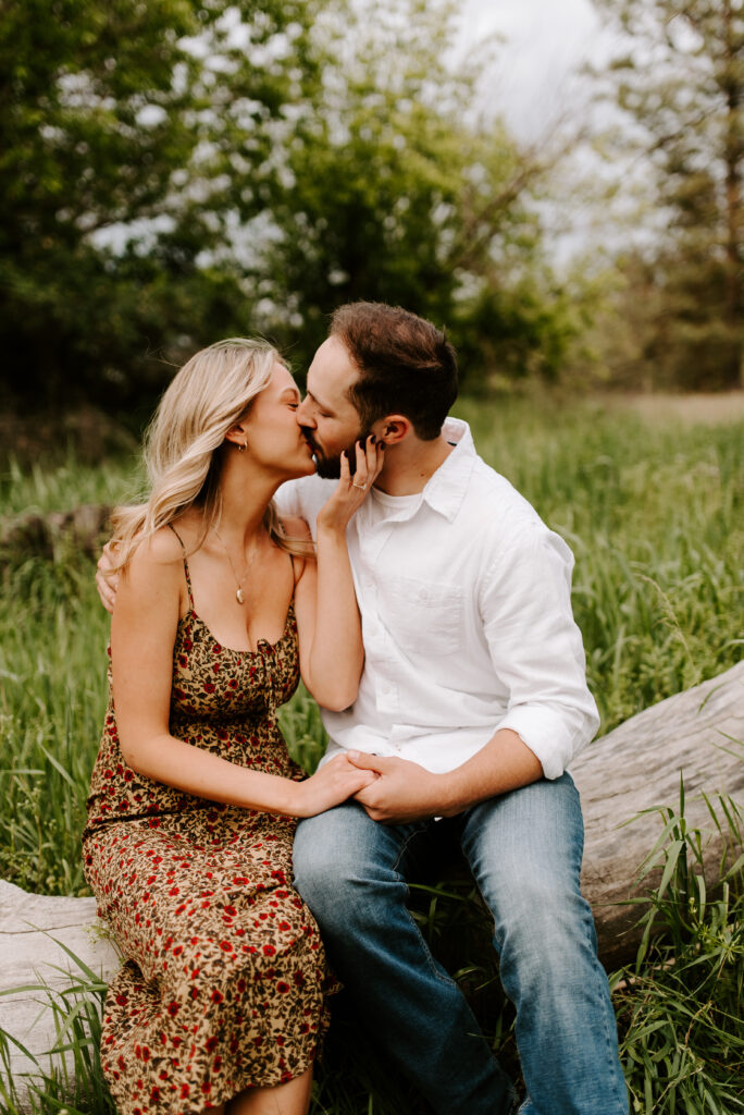 future bride and groom kissing