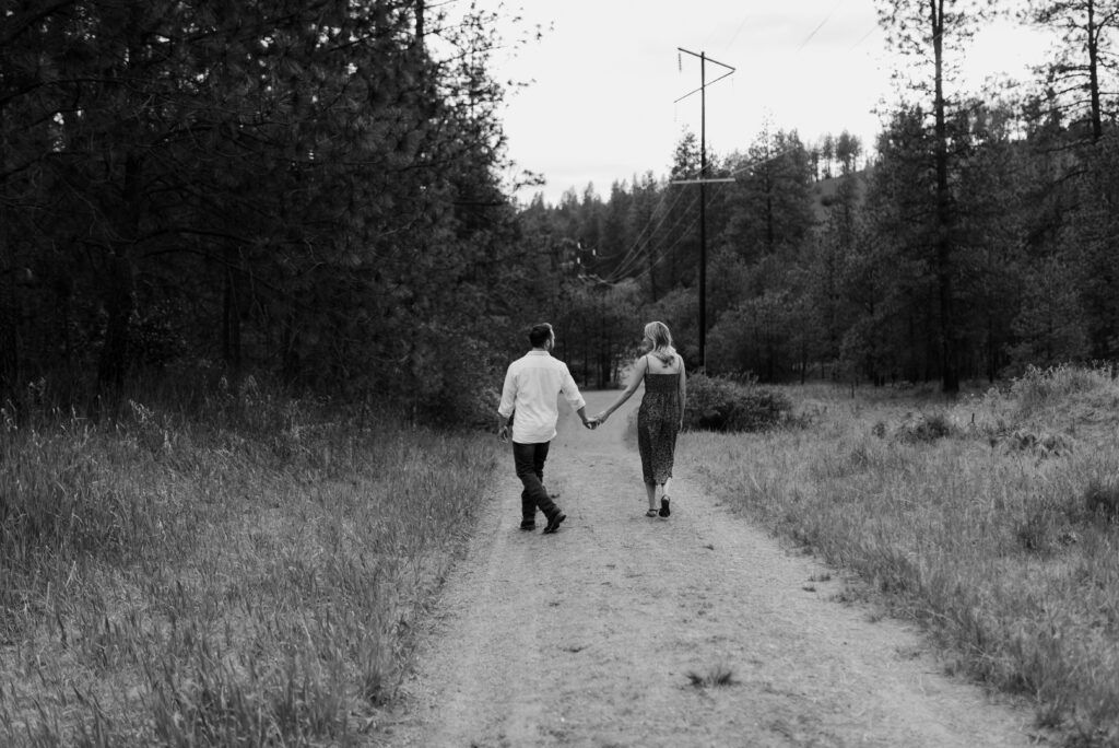 couple walking together on path