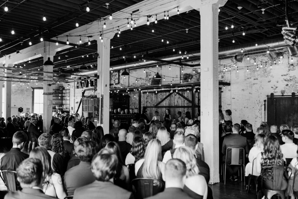 Wedding guests listening to the wedding ceremony.