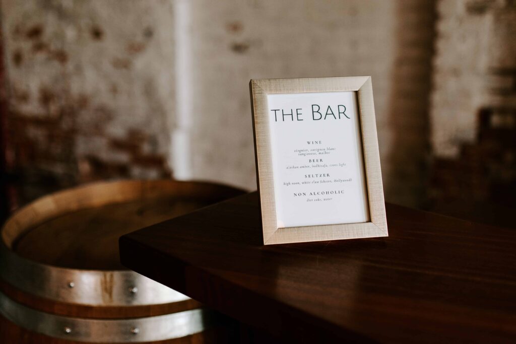 Bar service sign at a wedding at Overbluff Cellars featuring their in-house wine.